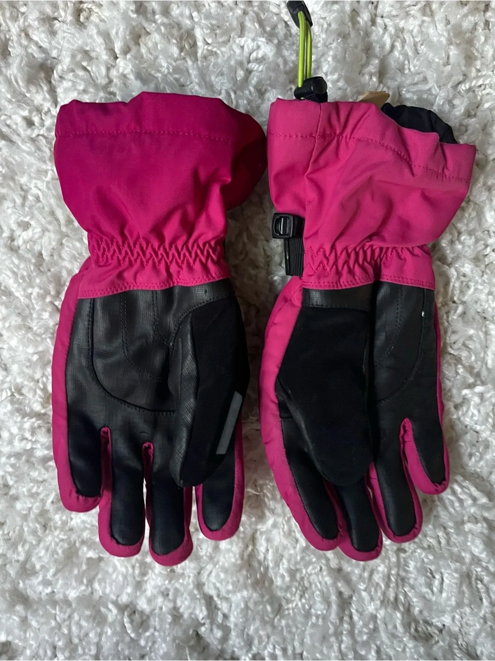 The North Face Bright Pink Kids' waterproof gloves with Neon Lime Strap